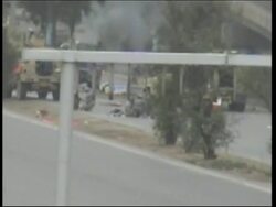 Two US soldiers killed in roadside bomb, 10 Iraqis killed in car bomb News Clip