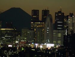WS View of Shinjuku skyline with Mount Fuji  in background  at night / Tokyo, Tokyo-To, Japan Stock Footage