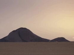 Ben Amera monolith at sunrise Stock Footage