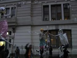 Hand-held skeleton puppets at the NYC halloween parade  Stock Footage