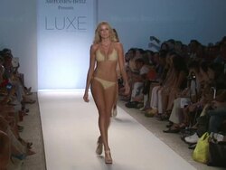 Models walk the runway during the Luxe by Lisa Vogel swimwear 2012 show Stock Footage
