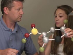 Daughter Shows Father her Science Project of a Molecule Stock Footage