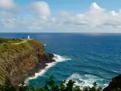 WS T/L Kilauea Lighthouse and crushing waves / Kilauea, Kauai, Hawaii, United States Stock Footage