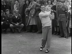 B/W 1944 Bob Hope practicing swing at golf competition raising funds for War Bonds / crowd in background Stock Footage
