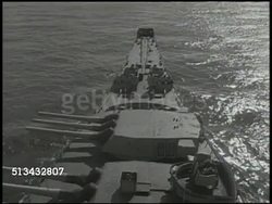 1945: UNITED STATES THIRD FLEET:  VS U.S. Navy 3rd Fleet battleships at sea, Pacific Ocean. INT VS Fleet Admiral William 'Bull' Halsey, Jr. (aka 'Bill' 1882-1959) talking w/ officers in intelligence room. World War II, WWII, Pacific Front Instructional Video