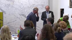 Prince Charles walking from podium at Royal Society News Clip