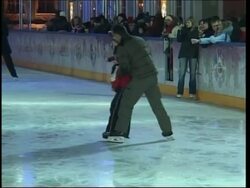 Russians talk politics at the official start of the ice skating season. News Clip
