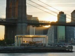 Brooklyn Bridge and Manhattan skyline at sunset. Stock Footage