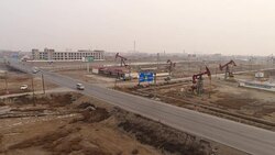 Aerial View of Oil Field, Oil Tank Truck and Air Pollution In China Stock Footage
