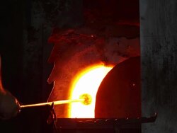 Glass Maker Preparing Hot Glass CU Stock Footage