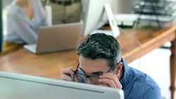 Giving the project his full attention Stock Footage