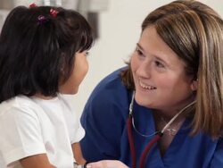 " medical worker checking heart of a young hispanic patient/Richmond,Virginia, USA " Stock Footage