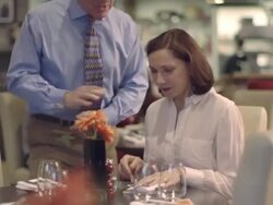 MS TU  Young couple drinking wine in restaurant, waiter serving food Stock Footage