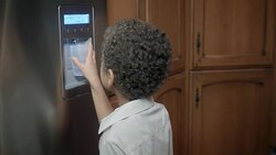 HD: Little Boy getting Water from the Refrigerator Stock Footage