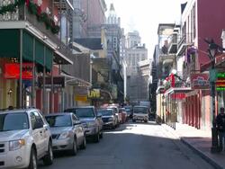 Downtown morning view from Bourbon Street in New Orleans Stock Footage