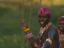 Maasai or Samburu Young warriors throwing spears, WITH AUDIO Stock Footage