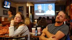 Chris Wallace speaks to America's peaceful transition of power. Debate viewers in Indiana react while watching on TV as Donald Trump and Hillary Clinton debate for the third and last time Stock Footage