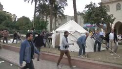 Supporters and opponents of Morsi clash outside presidential palace News Clip