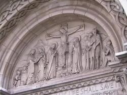 Stone carving above door of church, religious scene, Belfast, Northern Ireland Stock Footage