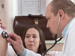 HD: Pediatrician Listening To Little Girl's Breathing Stock Footage