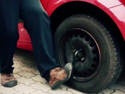 HD - Car Wheel Unscrewing Stock Footage
