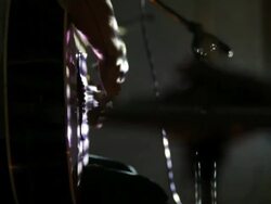 C/U change of focus, from guitar player to hi-hat cymbal Stock Footage