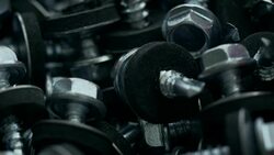 Heap of screws with rubber gaskets and flat washers Stock Footage
