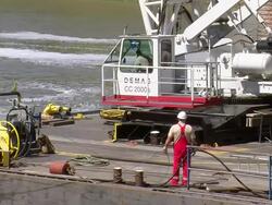 MS Worker ready to operate crane for deconstruction of bridge over river Mosel / Wellen, Rhineland Palatinate, Germany Stock Footage