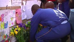 Mandela's daughter visits her father, police leave tributes, doves released News Clip