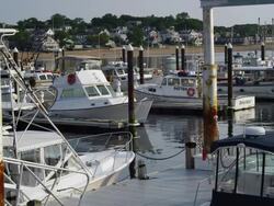 small pleasure boats on pier in Cape Cod Stock Footage