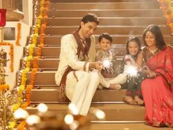 Family playing with fire crackers in diwali festival Stock Footage
