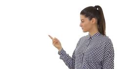 Beautiful young woman showing three points on copy space. Stock Footage