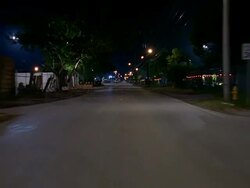 POV car riding in suburban area at night Stock Footage