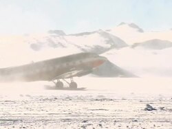 WS TS of DC-3 plane taxiing for taking off in snow / Union Glacier, Heritage Range, Ellsworth Mountains, Antarctica  Stock Footage