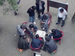 HA MS Men playing poker in park/xian,shaanxi,China Stock Footage