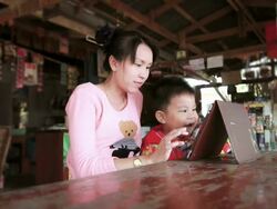 Mother and son using tablet. Stock Footage