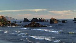 Indian Point volcanic rocks at sunset Stock Footage