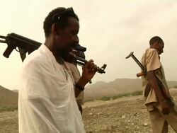 Afar men carrying guns, Stock Footage