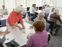 HD DOLLY: Seniors Playing Cards Stock Footage