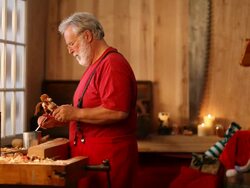 Christmas Video of Santa Claus Painting Toys in Workshop Stock Footage