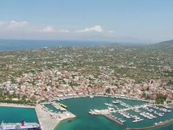 WS AERIAL View of sailboats and village of piraeus / Piraeus, Peloponnese, Greece Stock Footage