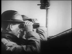 B/W 1940 close up PROFILE two soldiers using binoculars + pointing / London Blitz / educational Stock Footage