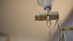 Infusion bottle with IV solution to help patient Stock Footage