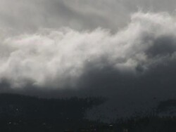 WS View of snow falling with sparkles in sun at Colorado Rockies in winter storm / Colorado, United States Stock Footage