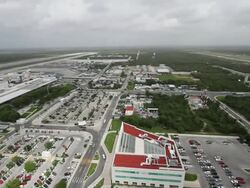 AERAIL WS View of air traffic control tower / Cancun, Quintana Roo, Mexico Stock Footage