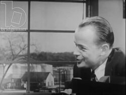 Man at work with his colleagues. USA, 1953 Stock Footage