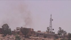 CLEAN : Sanaa: smokes billow over the State TV building News Clip