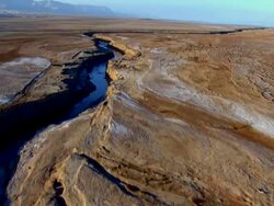WS AERIAL  View of Muddy surface of  dead sea / Sourn Judea Desert, Israel  Stock Footage