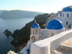WS View of church dome with Ocean at village Oia / Santorini, Cyclades, Greece Stock Footage
