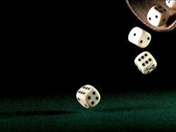 High speed dice falling from dice box on green velvet Stock Footage